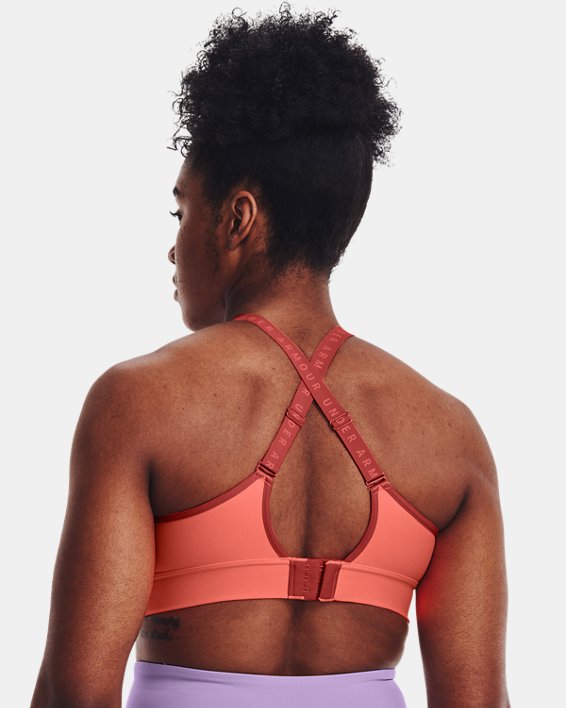 Women's UA Infinity Mid Covered Sports Bra in Orange image number 1